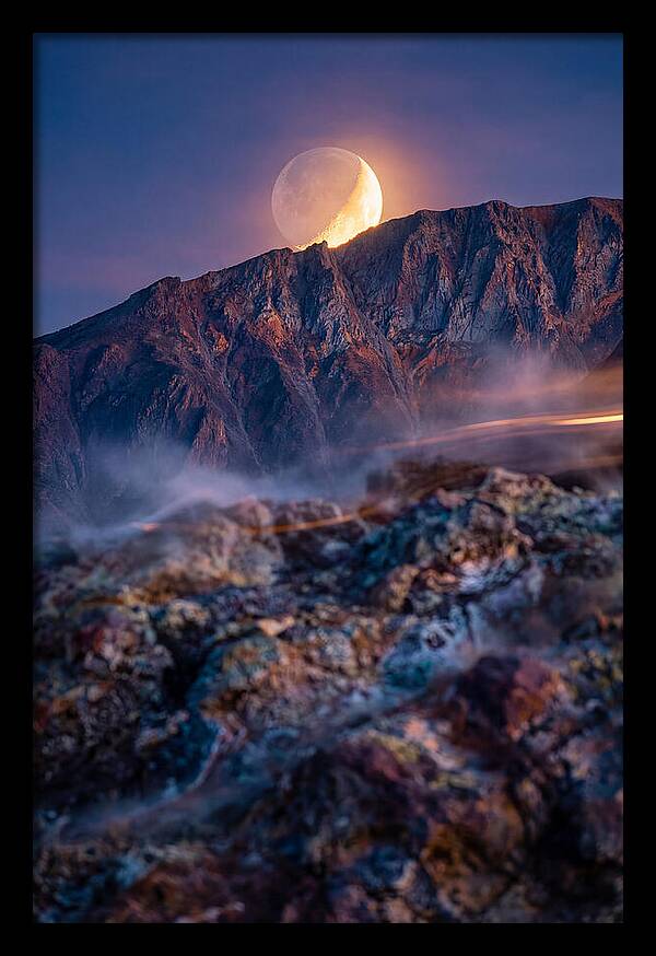 Serene Moonlight Above Towering Mountains