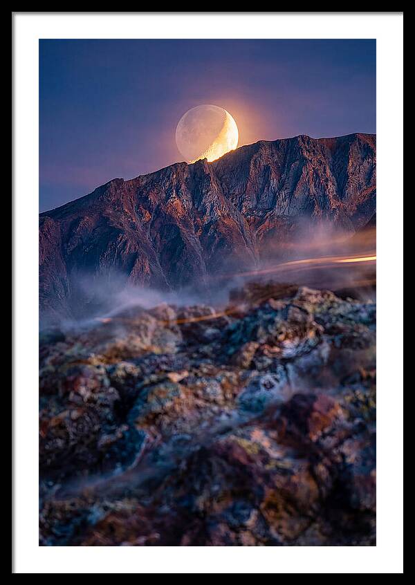 Serene Moonlight Above Towering Mountains