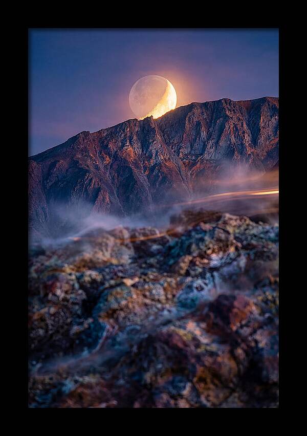 Serene Moonlight Above Towering Mountains