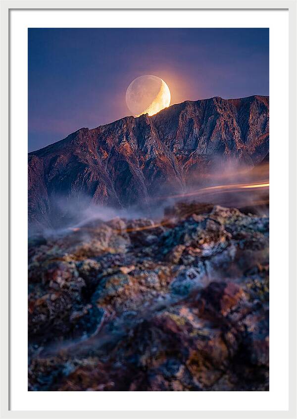 Serene Moonlight Above Towering Mountains