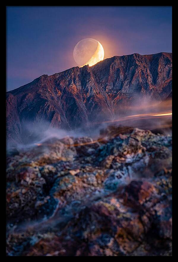 Serene Moonlight Above Towering Mountains