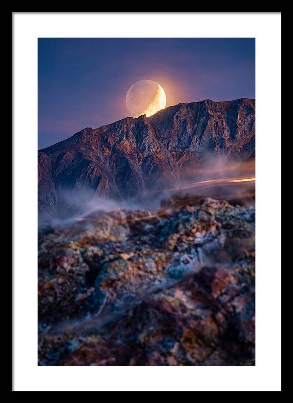 Serene Moonlight Above Towering Mountains