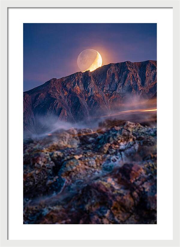 Serene Moonlight Above Towering Mountains