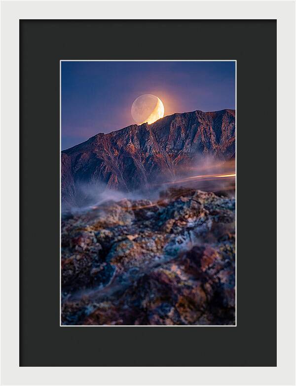 Serene Moonlight Above Towering Mountains