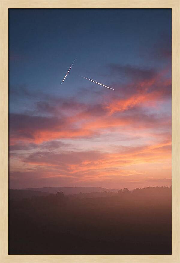 Shooting Stars Over Twilight Sky