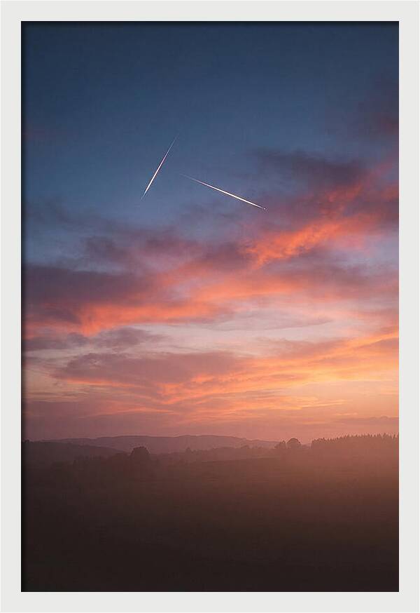 Shooting Stars Over Twilight Sky