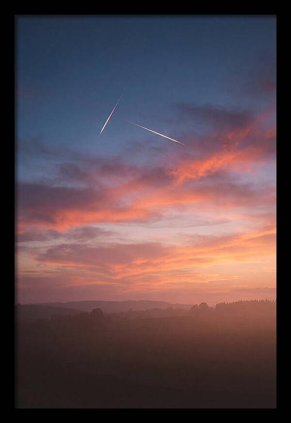 Shooting Stars Over Twilight Sky