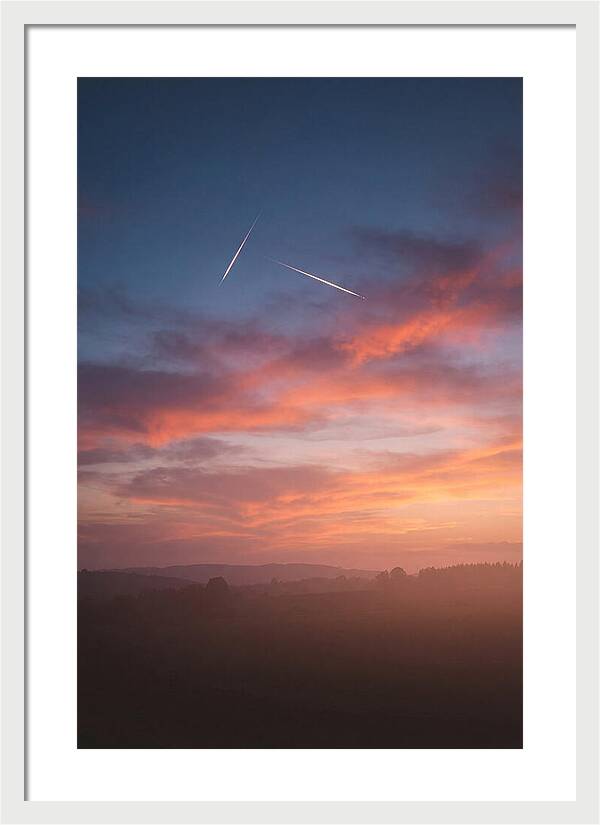 Shooting Stars Over Twilight Sky