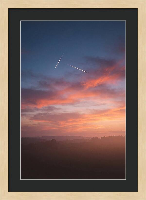 Shooting Stars Over Twilight Sky