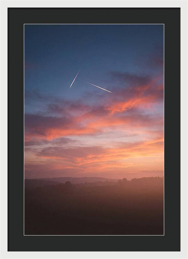 Shooting Stars Over Twilight Sky