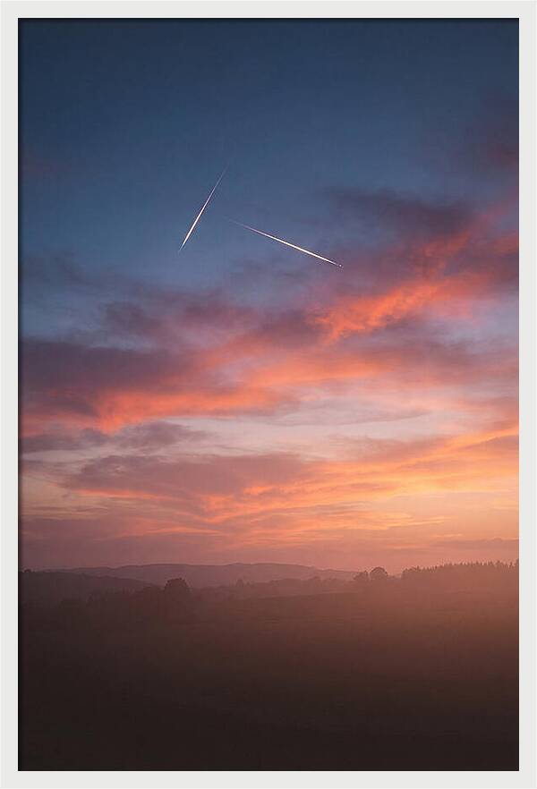Shooting Stars Over Twilight Sky