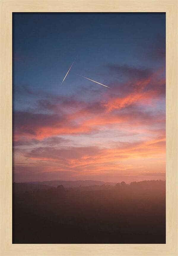 Shooting Stars Over Twilight Sky