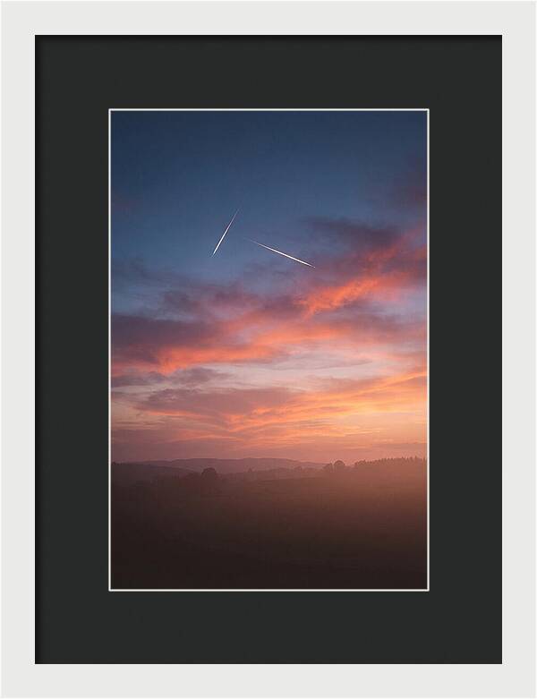 Shooting Stars Over Twilight Sky