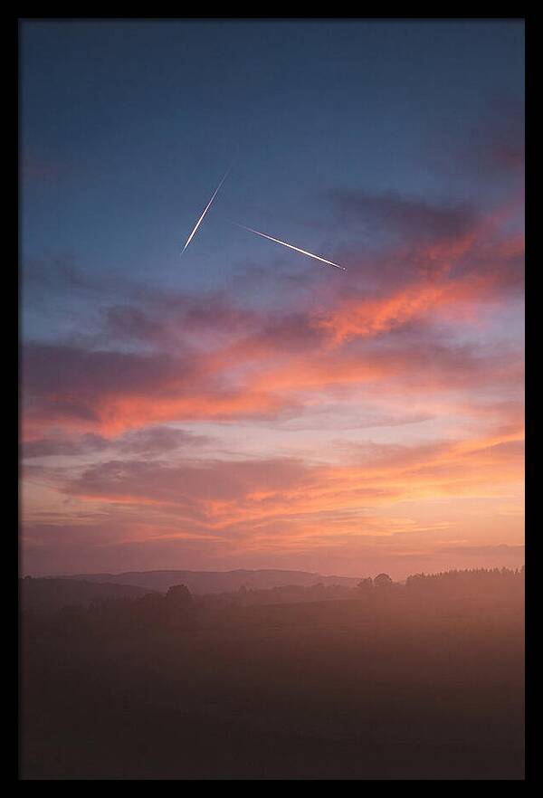 Shooting Stars Over Twilight Sky