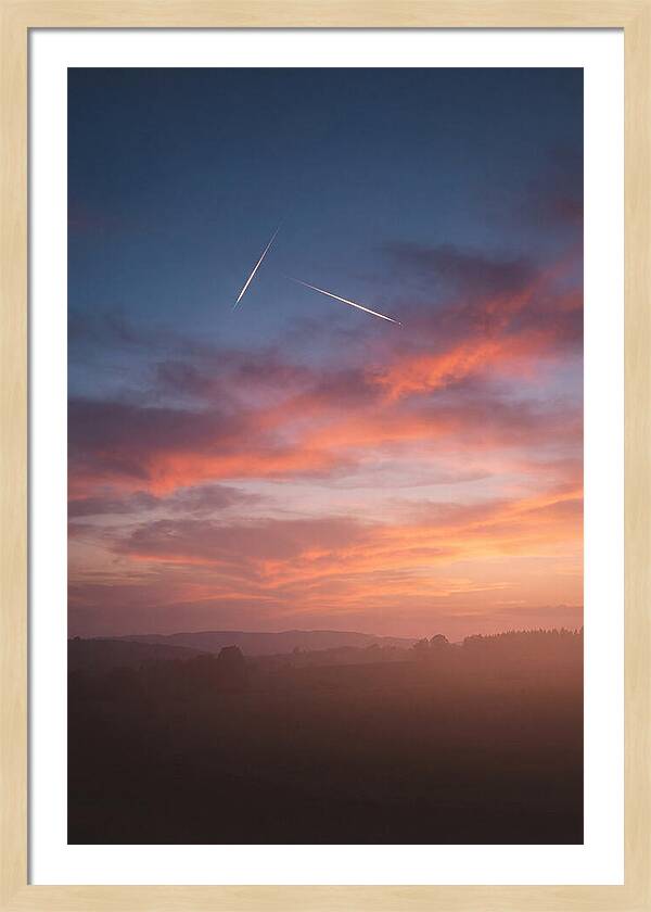 Shooting Stars Over Twilight Sky