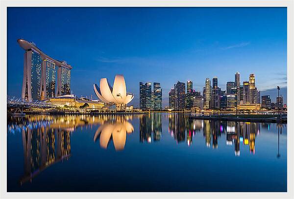 Singapore Skyline Reflected At Blue Hour