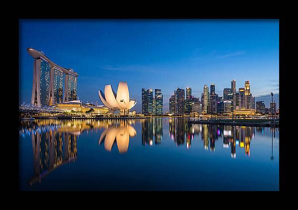 Singapore Skyline Reflected At Blue Hour