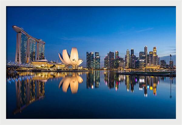 Singapore Skyline Reflected At Blue Hour