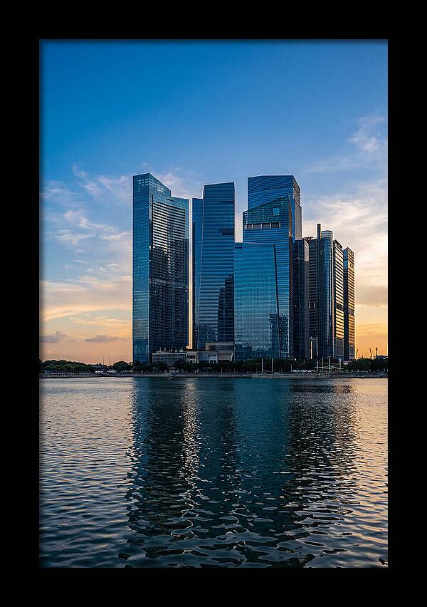 Singapore Skyline Reflected In Water