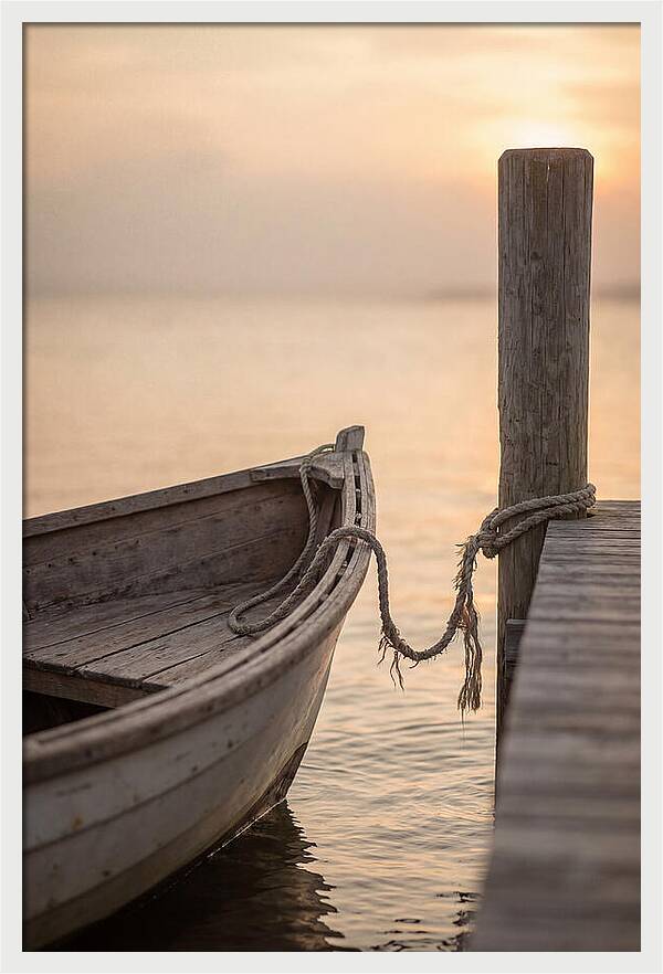 Small Dinghy At Sunset