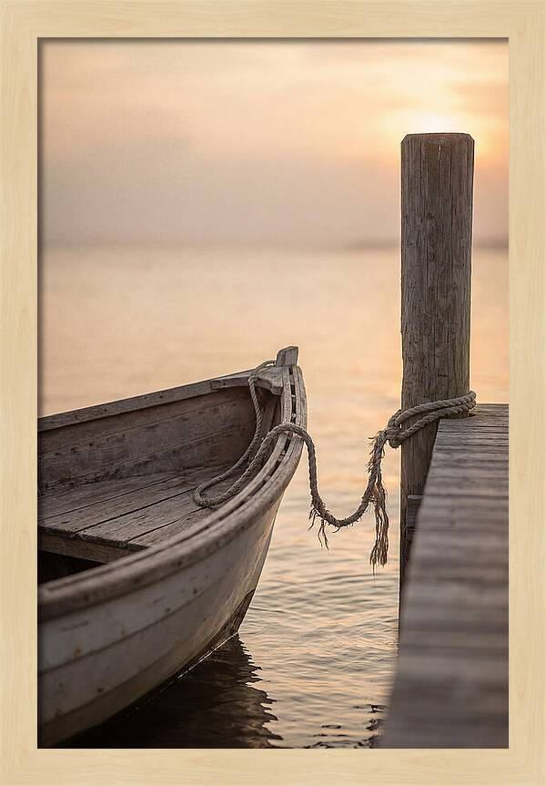Small Dinghy At Sunset