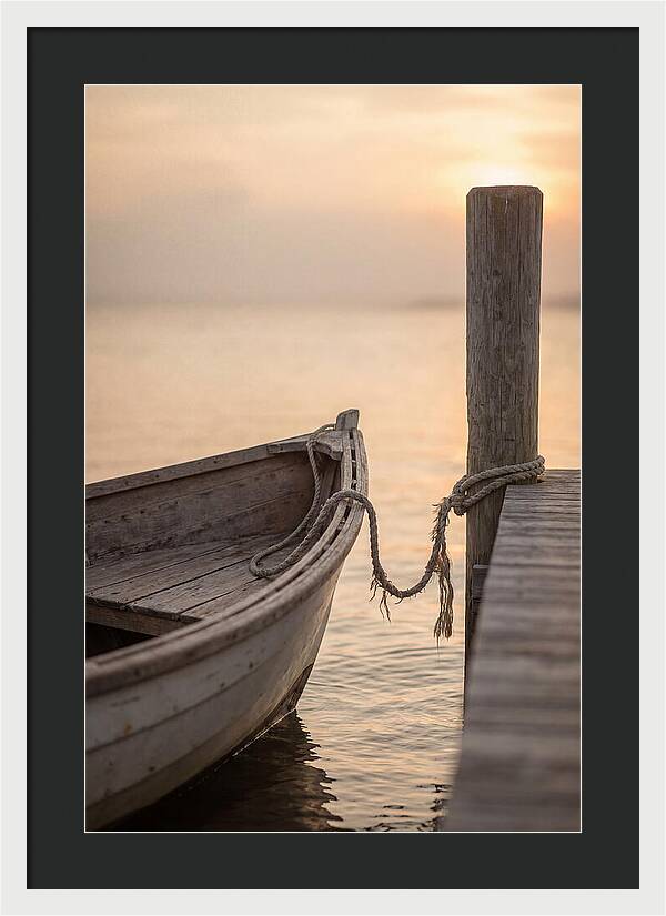 Small Dinghy At Sunset