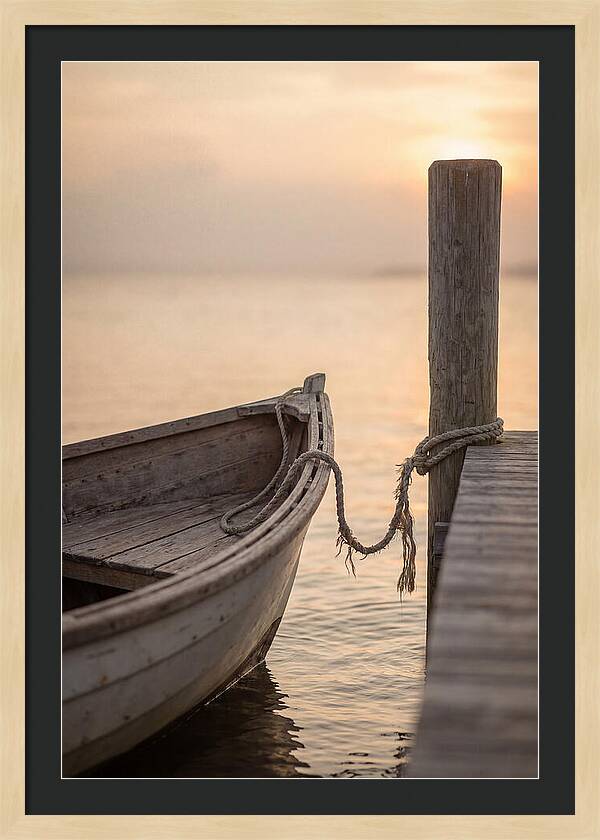 Small Dinghy At Sunset