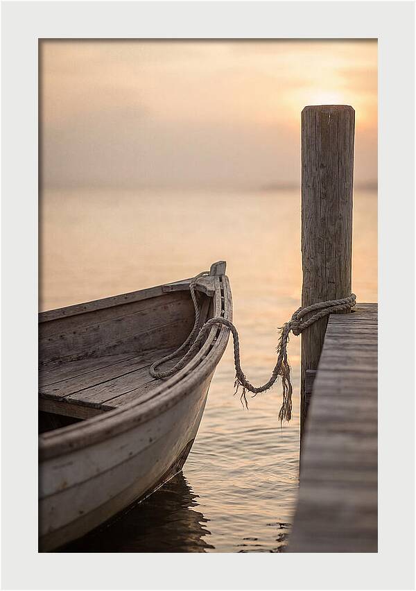 Small Dinghy At Sunset