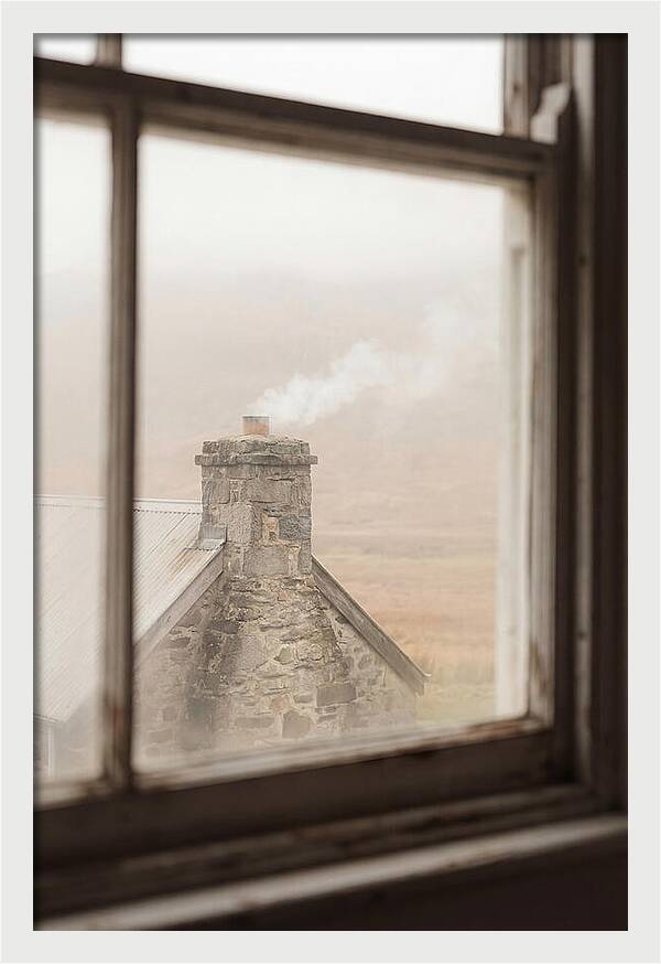 Smoke Wisping From The Chimney