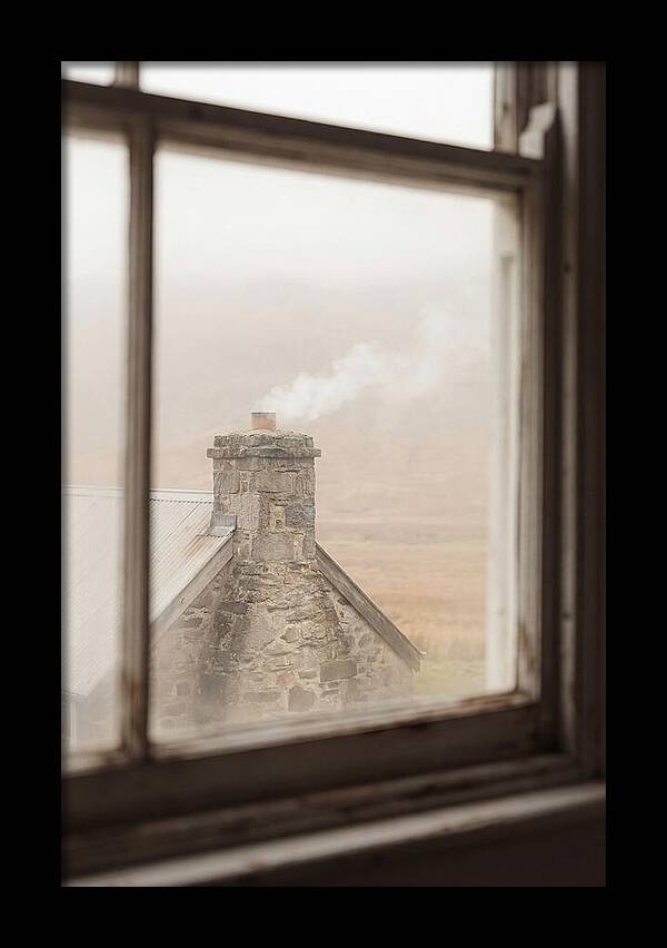 Smoke Wisping From The Chimney