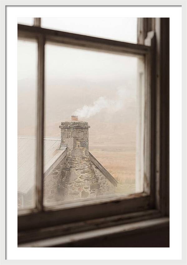 Smoke Wisping From The Chimney