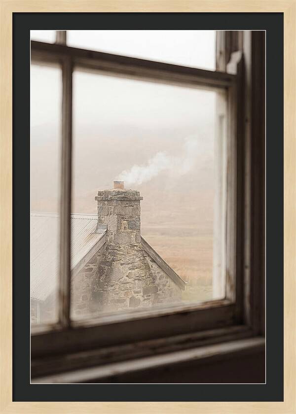 Smoke Wisping From The Chimney