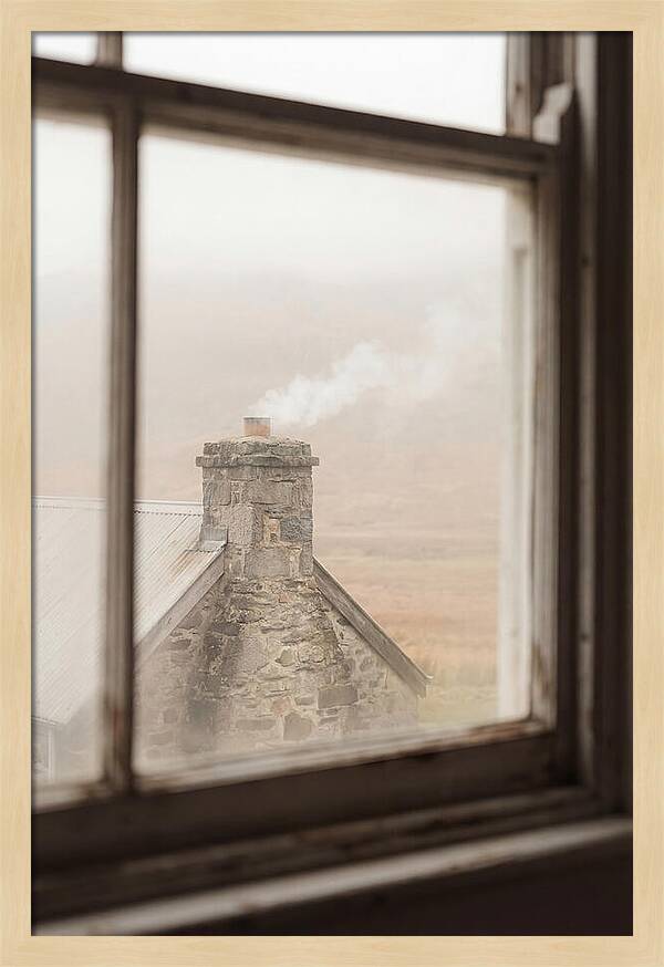 Smoke Wisping From The Chimney