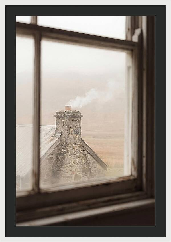 Smoke Wisping From The Chimney