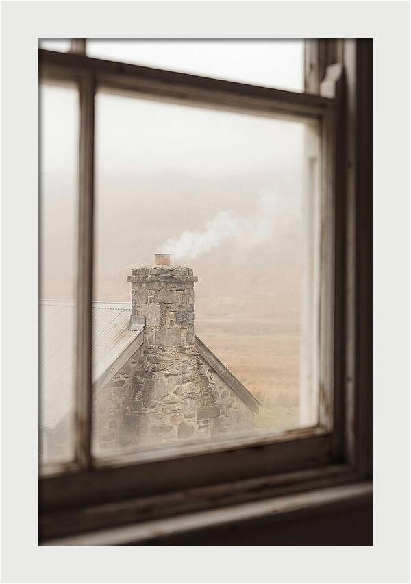 Smoke Wisping From The Chimney