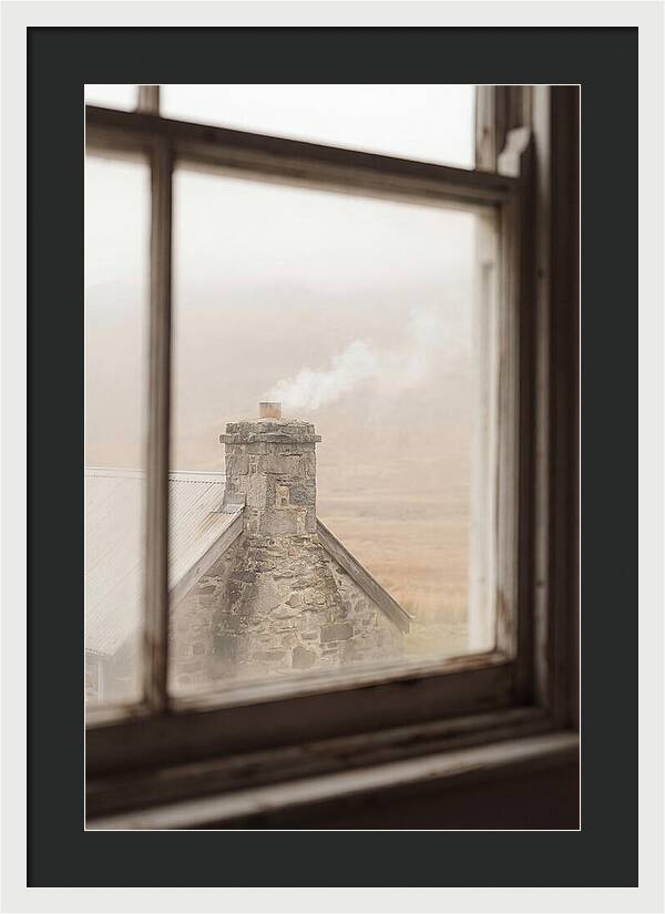 Smoke Wisping From The Chimney