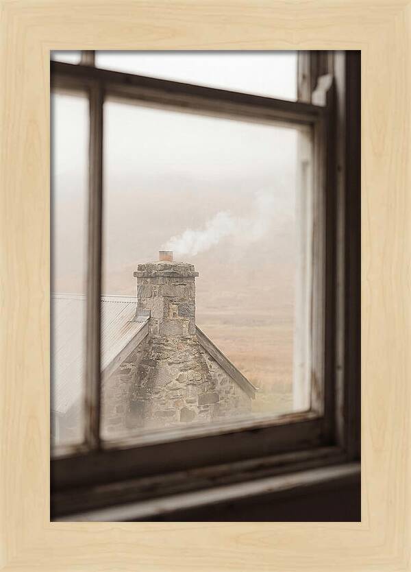 Smoke Wisping From The Chimney