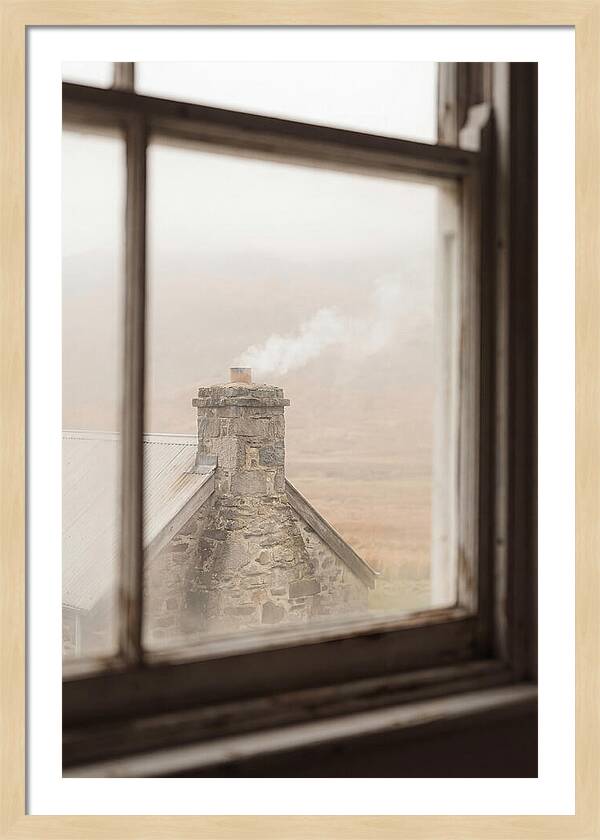 Smoke Wisping From The Chimney