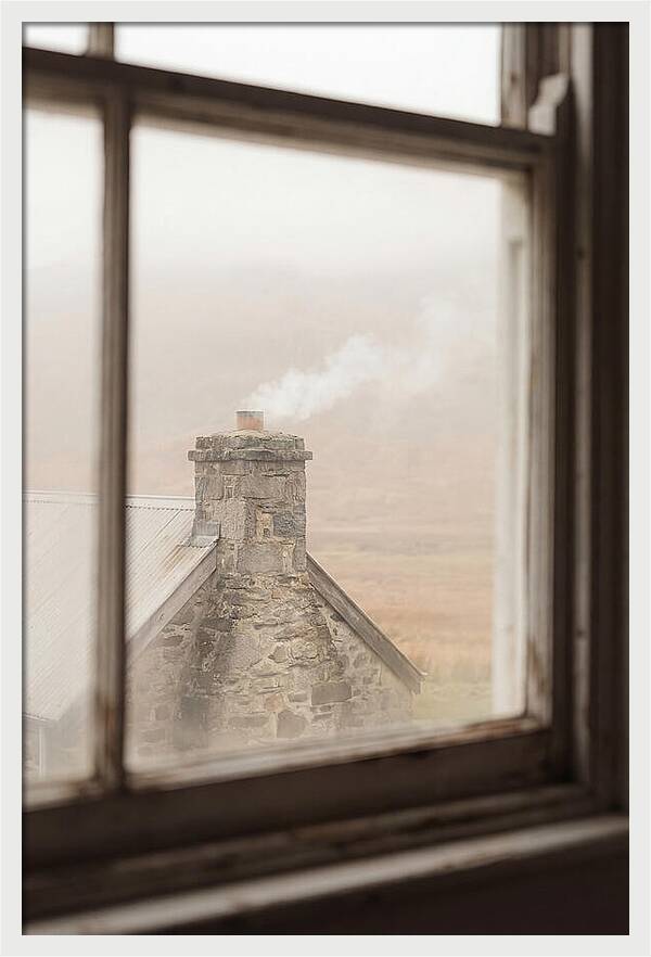 Smoke Wisping From The Chimney
