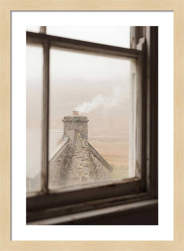 Smoke Wisping From The Chimney