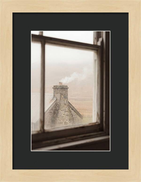 Smoke Wisping From The Chimney