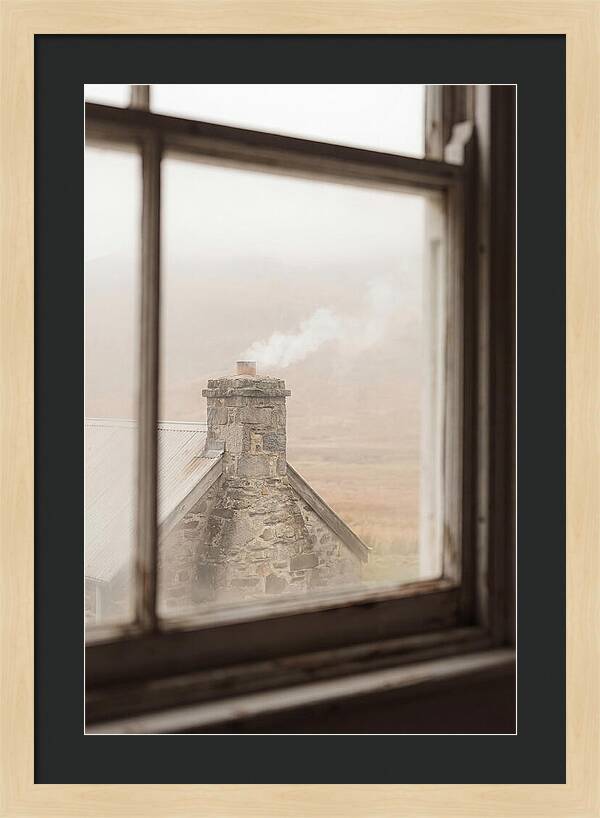 Smoke Wisping From The Chimney