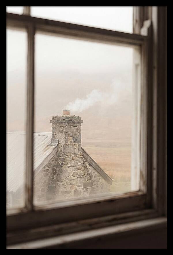 Smoke Wisping From The Chimney