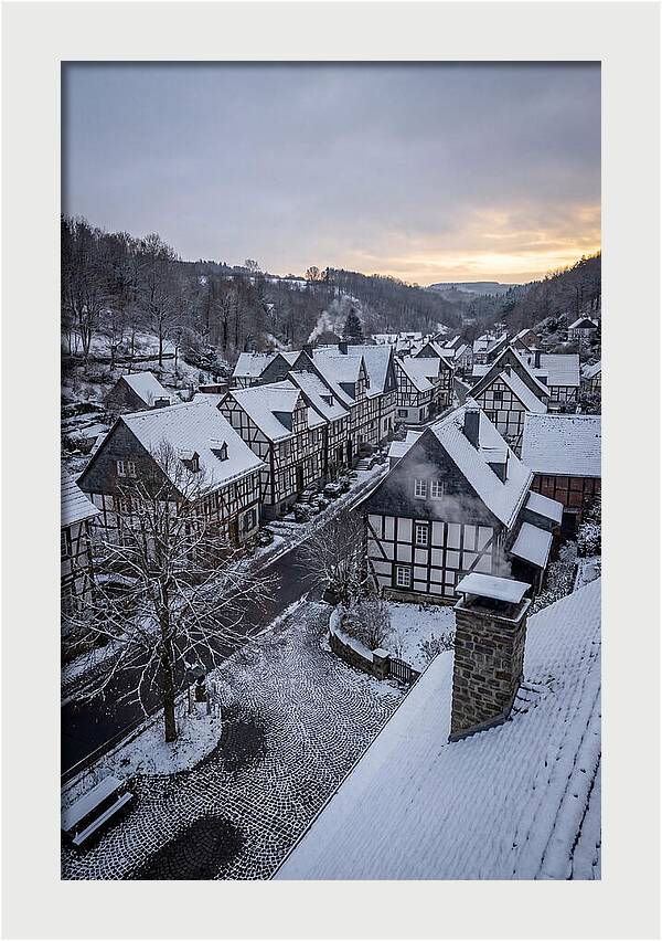 Snowcovered Village At Dusk