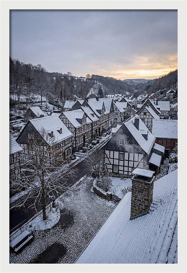 Snowcovered Village At Dusk