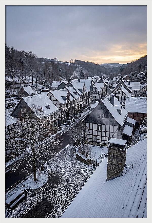 Snowcovered Village At Dusk