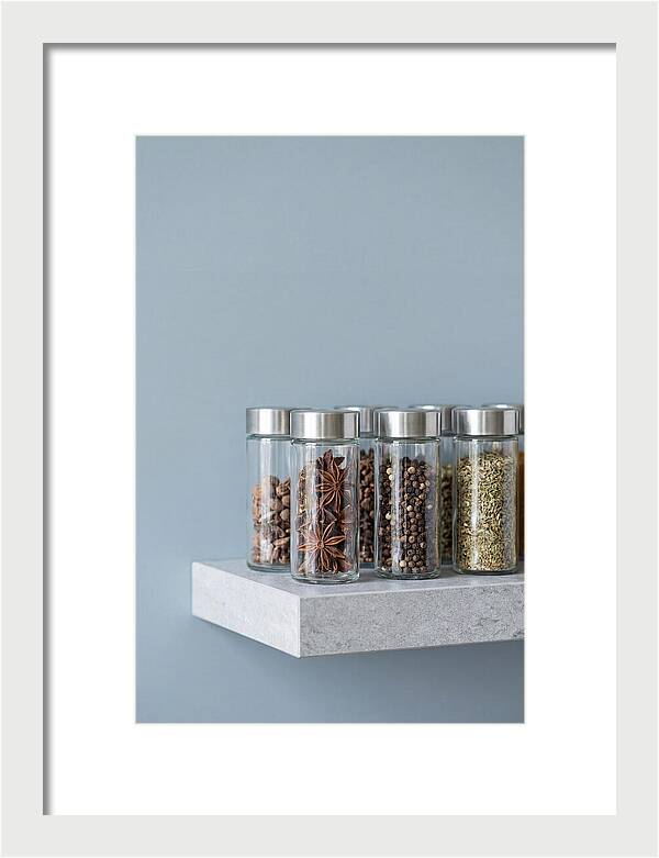 Spice Bottles On Shelf