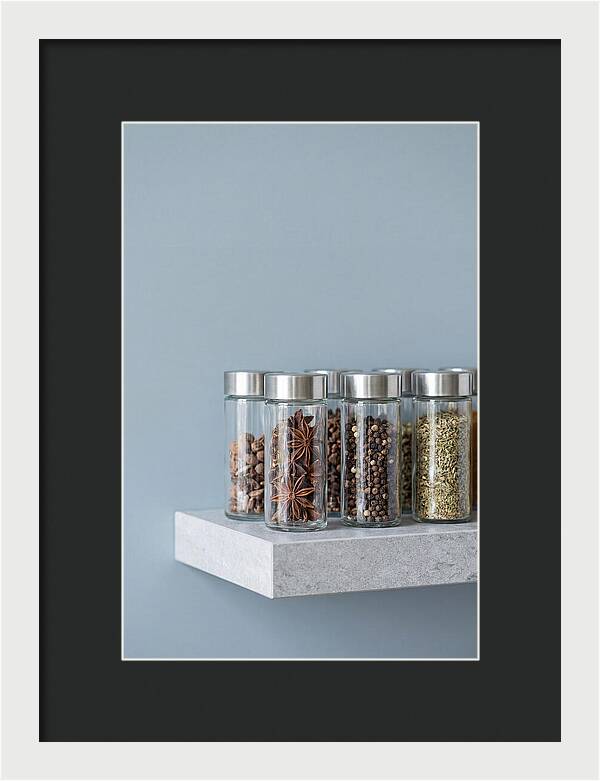 Spice Bottles On Shelf