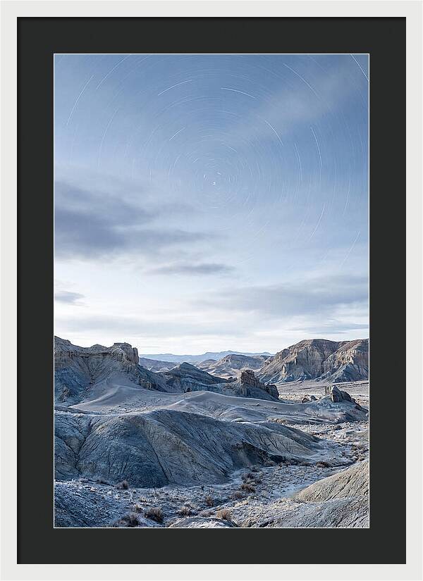Star Trails Over Serene Landscape