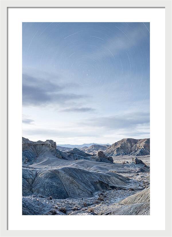 Star Trails Over Serene Landscape